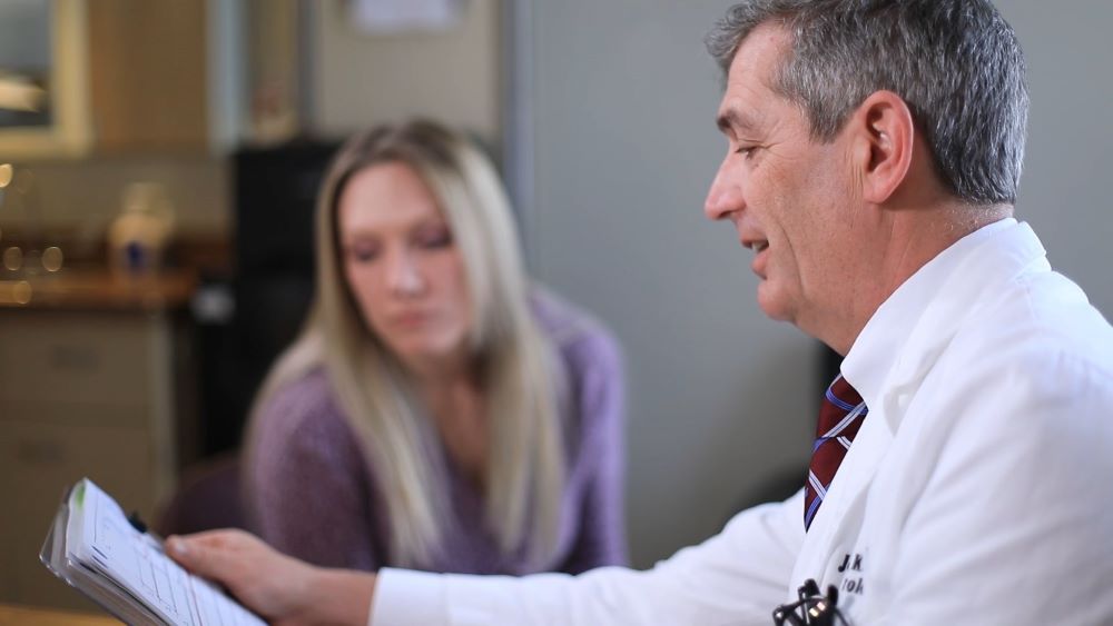 Urologist speaking with patient